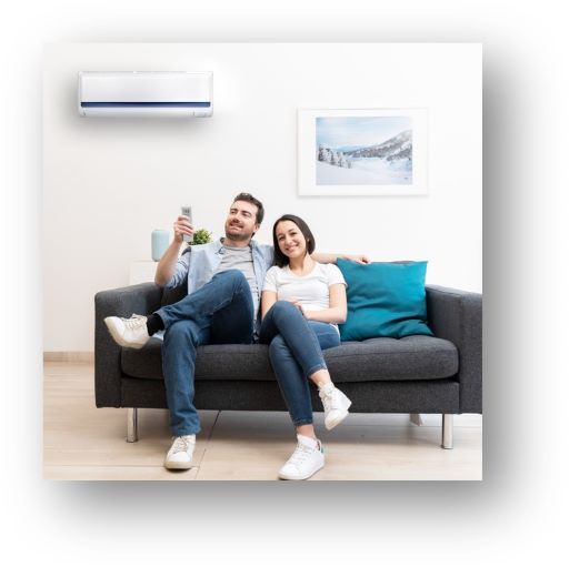 Couple sitting in the comfort of their heatpump