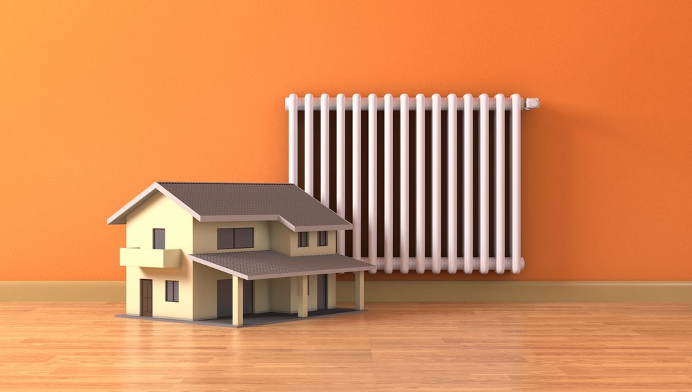 Concept art for home central heating with a house and a radiator.