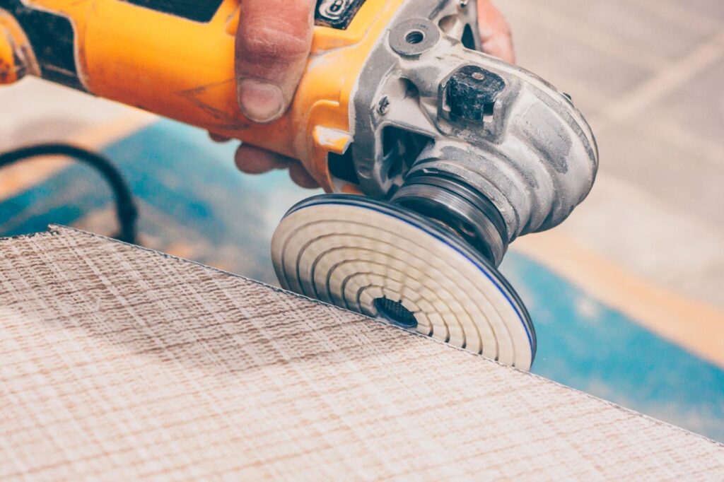 pool builder using tool for pool renovation