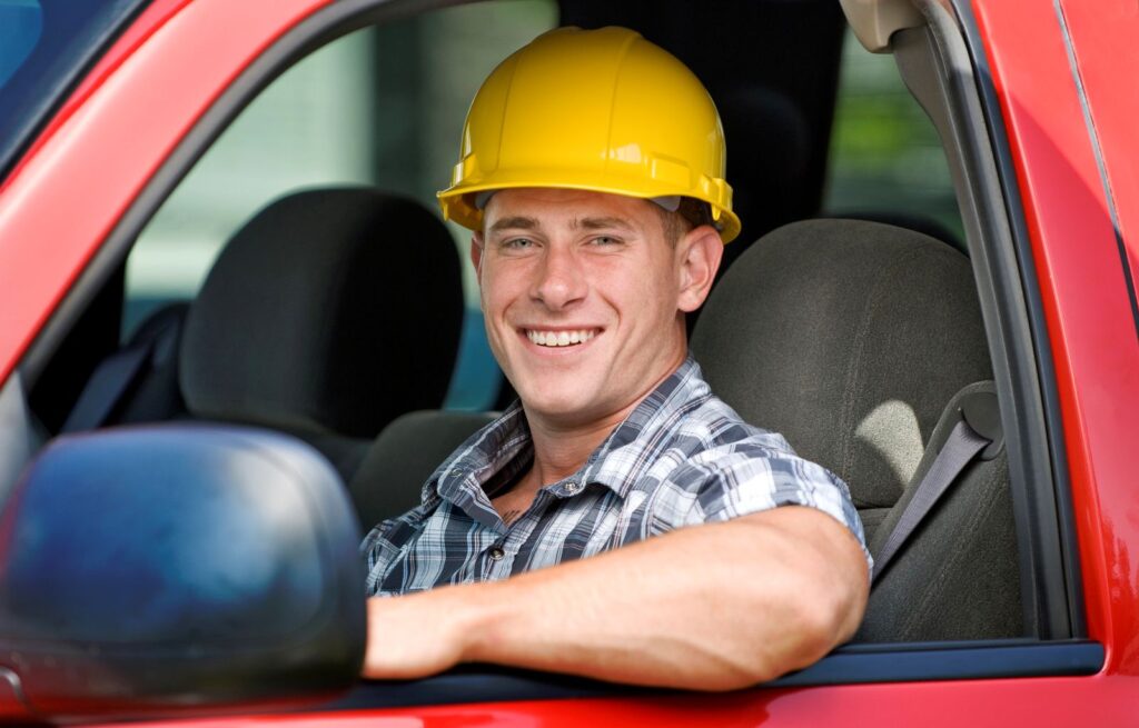 tradie smiling in vehicle